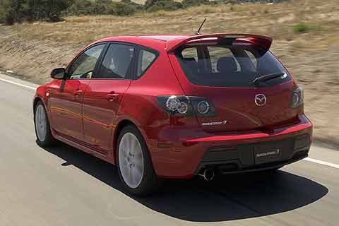 The MAZDASPEED3 The rear features a high-mounted rear spoiler at the end of the roof line and a large diameter tailpipe