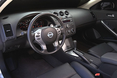 The Altima coupe's steering wheel has audio, telephone and cruise control buttons on it.