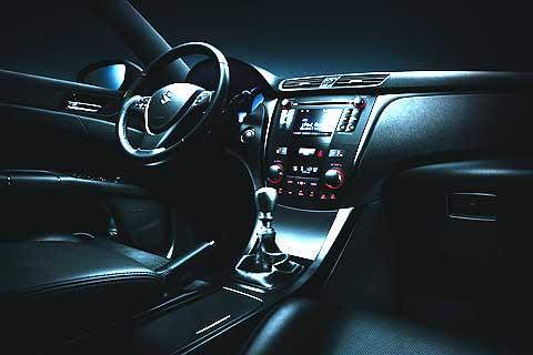 2011 Suzuki Kizashi has a sport steering wheel with perforated leather grip, contrasting stitching in the shifter boot and parking brake boot, leather seats when equipped with the sporty black leather interior